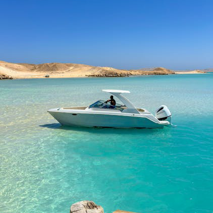 gogo tours free photo of serene red sea boat scene with clear skies About Us