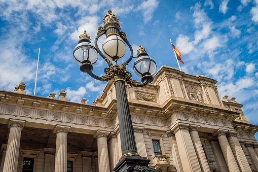 Historic neoclassical government building with columns.