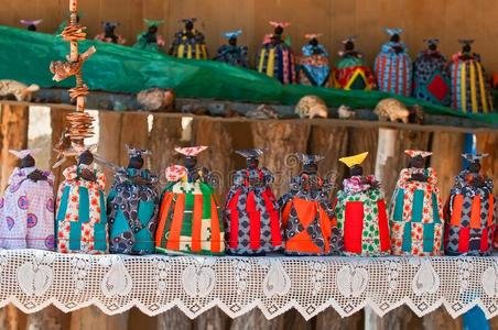 Handmade dolls at a South African craft market.