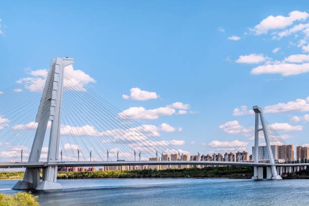 Modern suspension bridge over river in Ordos