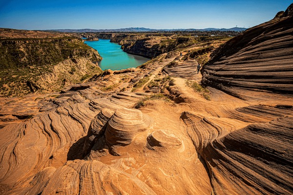 Unique rock formations and river in Jingbian, China.
