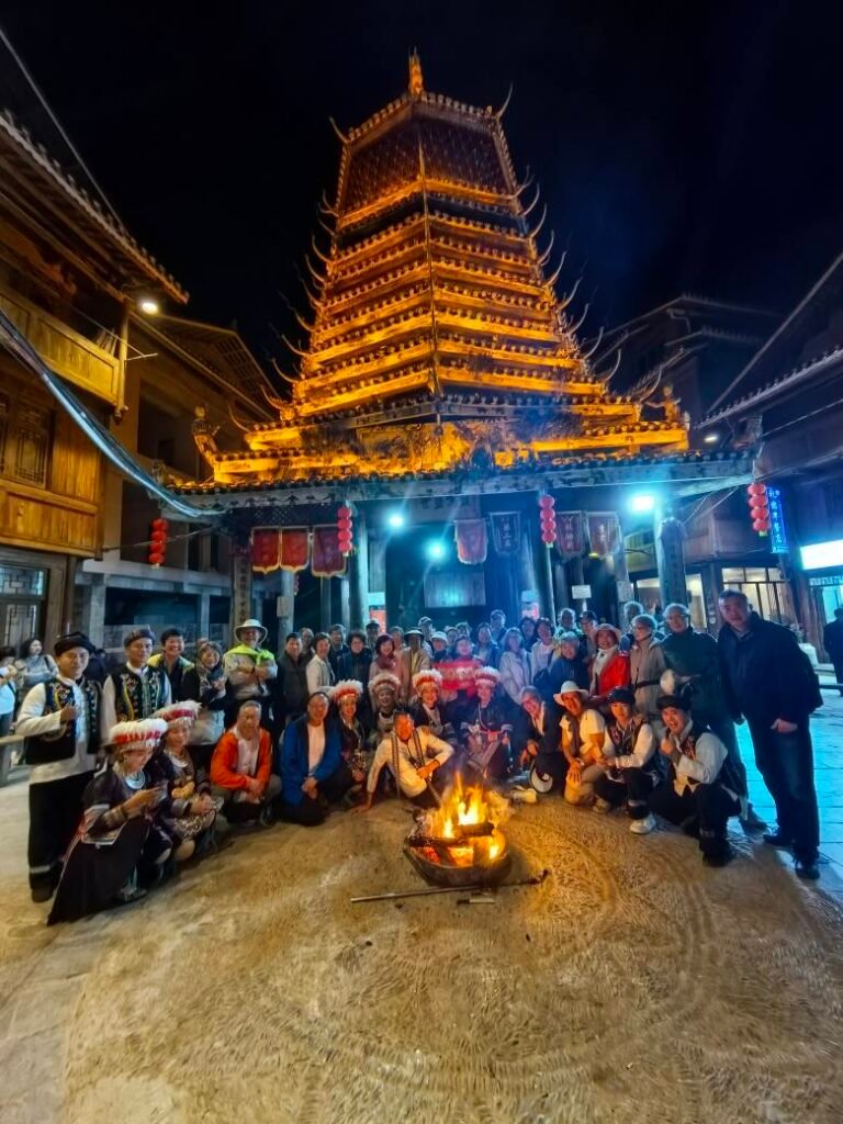 Night gathering Drum Tower Zhaoxing Dong Village Yunnan Guizhou China tour GoGo Tours