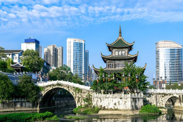 Jiaxiu Tower in Guiyang with modern buildings in the background