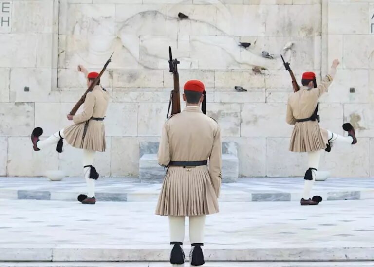 Traditional Evzones guards performing ceremony in Athens