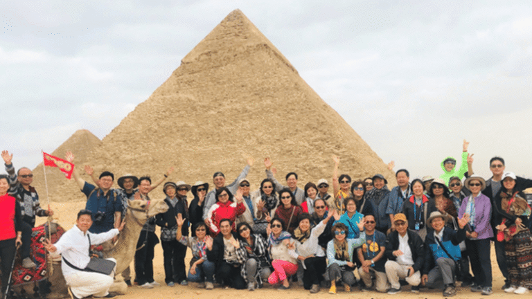 Group of travelers Pyramids of Giza Egypt GoGo Tours
