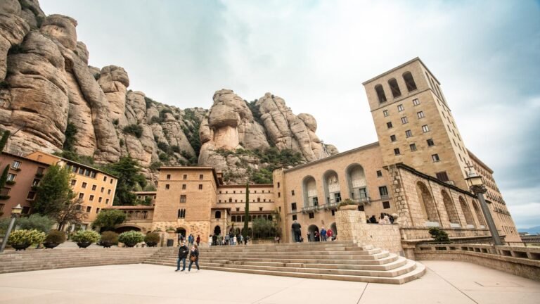 Montserrat Monastery nestled in rocky mountains.