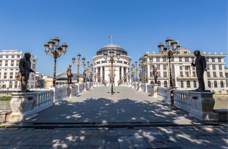 Skopje bridge with statues and historic architecture
