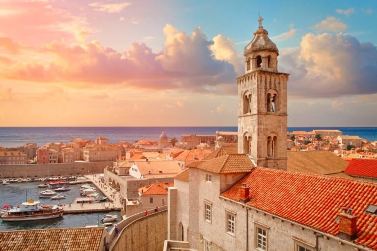 Dubrovnik Old Town at sunset with bell tower and sea view