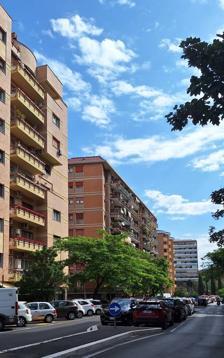 Urban street view with residential buildings in Italy