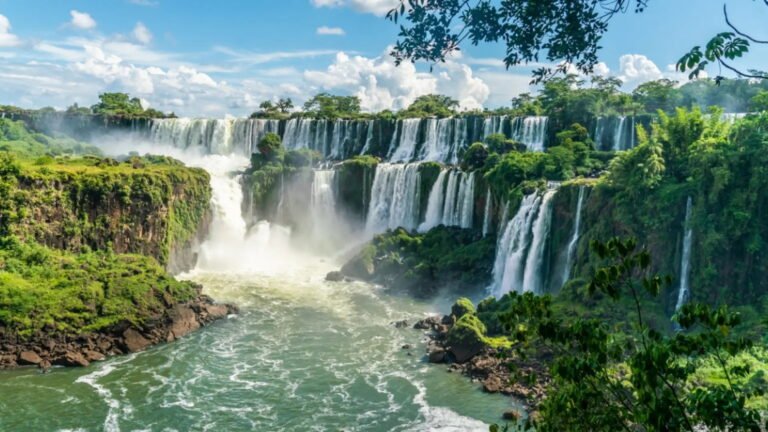Stunning view of Iguazu Falls with lush greenery.